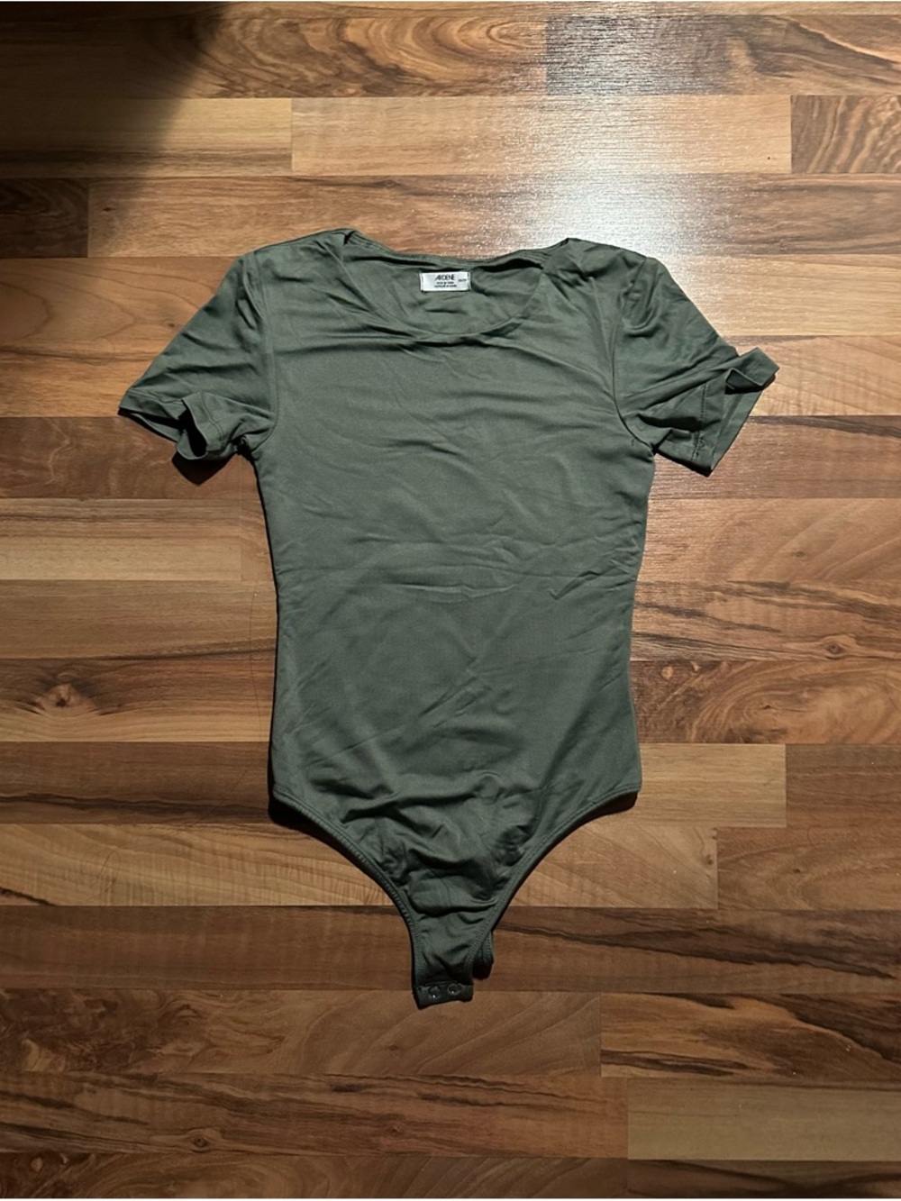 Woman black and green one piece